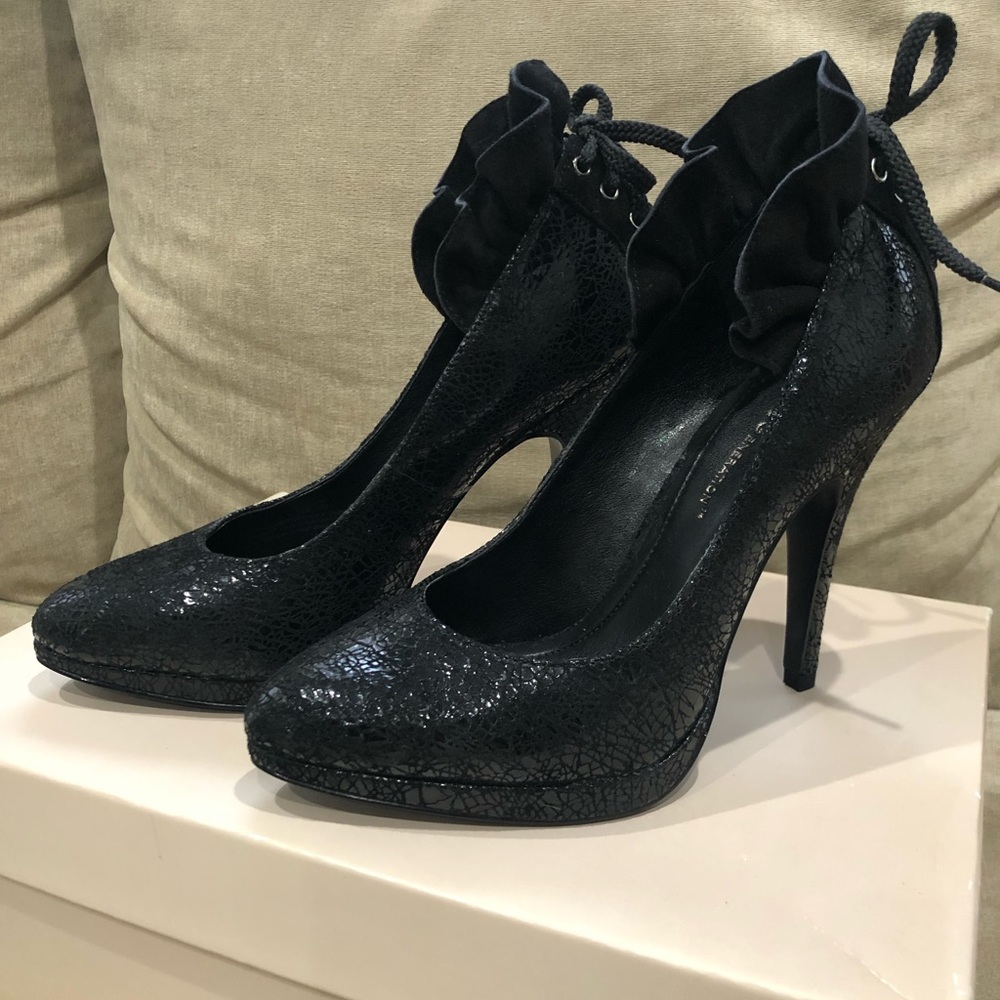 BCBG heels in black with lots of detail worn once